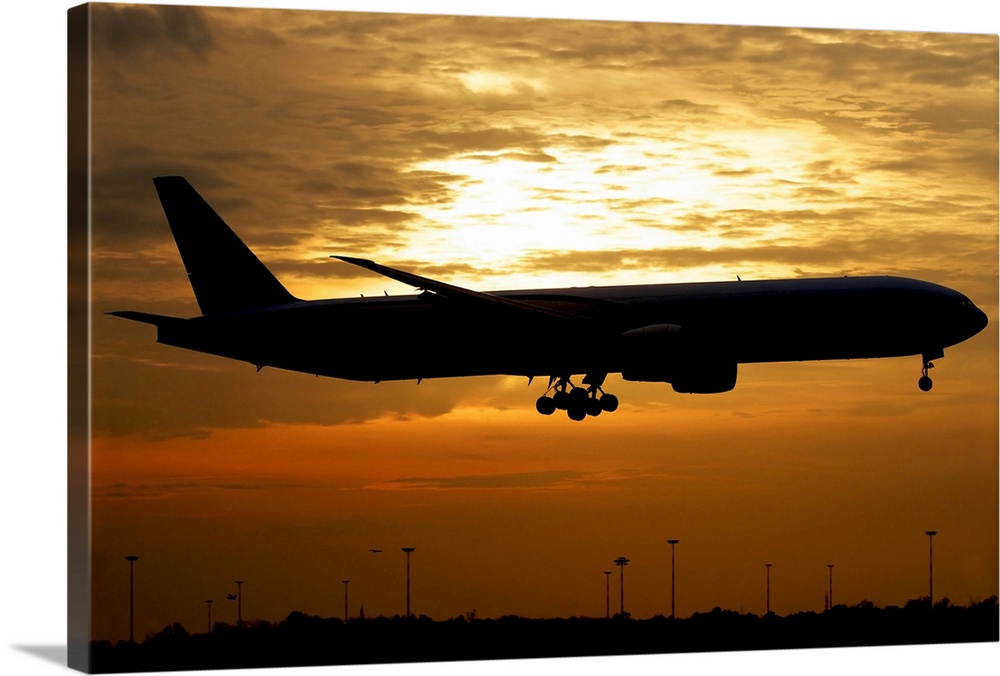 Silhouette of a Pakistan International Airlines Boeing 777, Milano Malpensa Airport, Italy.