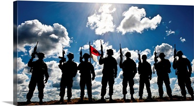 Silhouette of soldiers from the U.S. Army National Guard