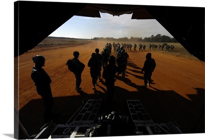 Soldiers Board A C-130 Hercules During Operation Toy Drop