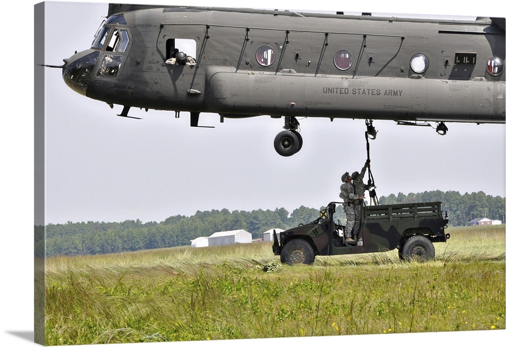 August 19, 2011 - Soldiers from the Fort Benning-based Warrior Training Center teach students sling load operations on a C...