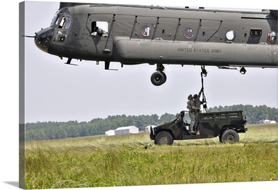 Soldiers Teach Students Sling Load Operations On A CH-47 Chinook