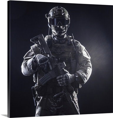 Special Forces Soldier With Rifle On Dark Background