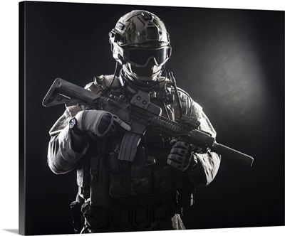 Special Forces Soldier With Rifle On Dark Background