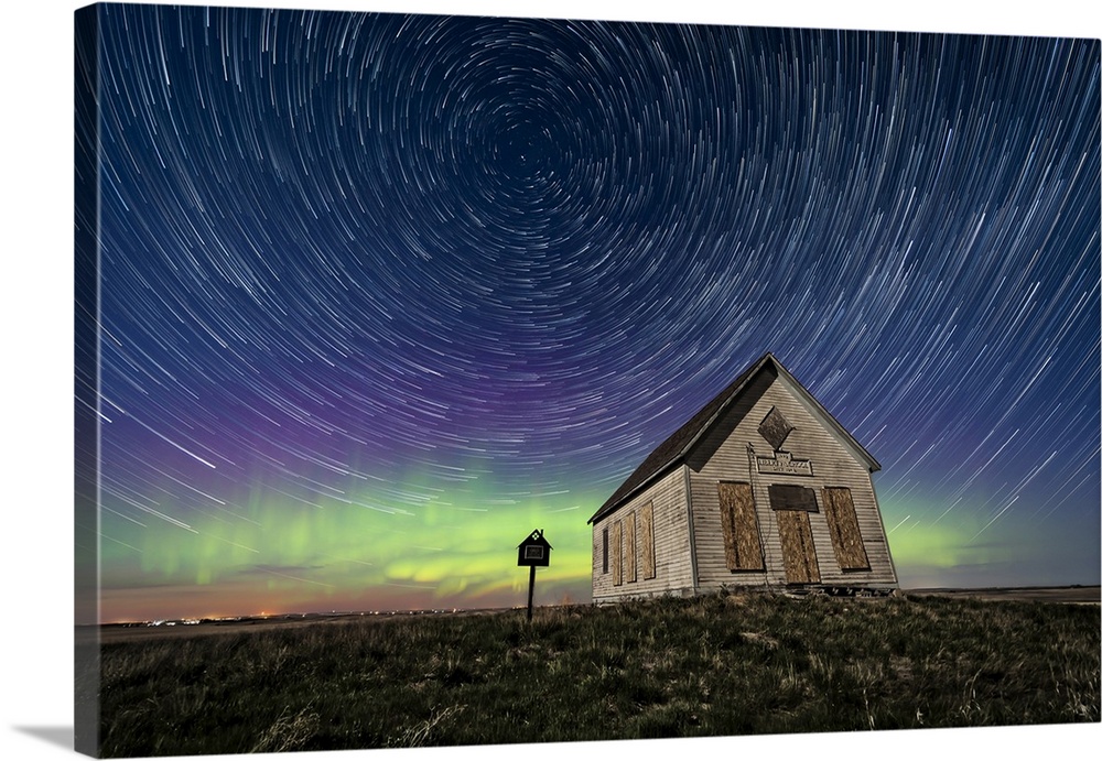 Star trails above the 1910 Liberty Schoolhouse in Alberta, Canada.