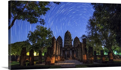 Star Trails Around The Northern Celestial Pole Above A Temple In Sukhothai, Thailand