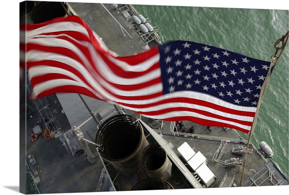 Stars and Stripes flying boldly as seen from the crow's nest aboard USS Donald Cook.