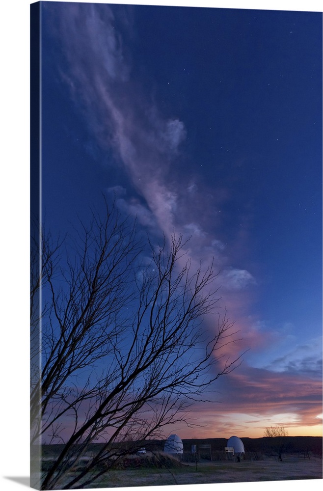 Strange column cloud over observatories at sunset, Crowell, Texas.