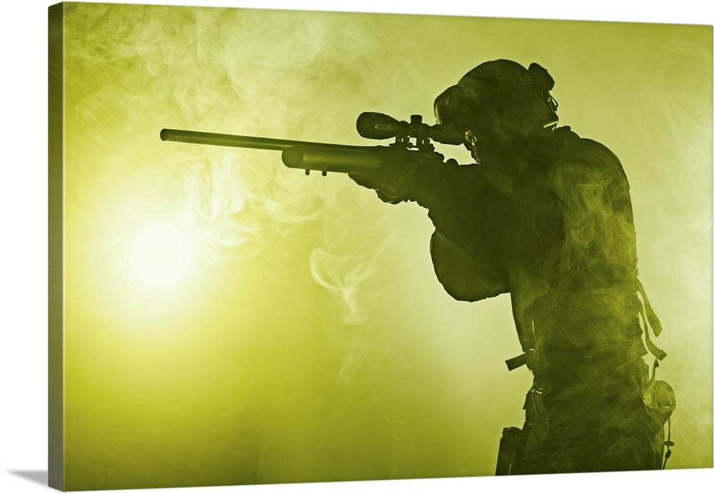 Studio shot of SWAT police operator with sniper rifle. Fire smoke screen background.