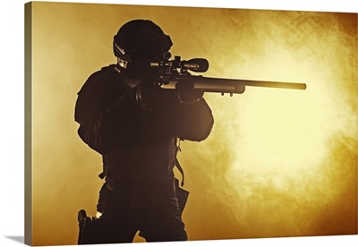 Studio Shot Of SWAT Police Operator With Sniper Rifle, Fire Smoke Screen Background