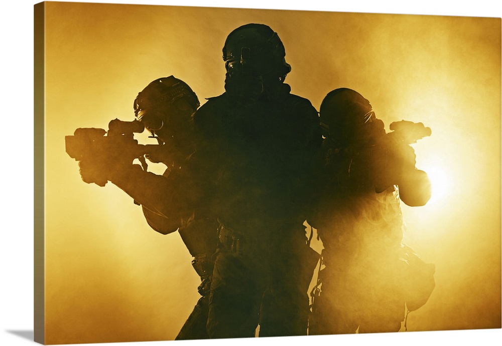 Studio shot of SWAT police special forces aiming weapons. Orange fire background