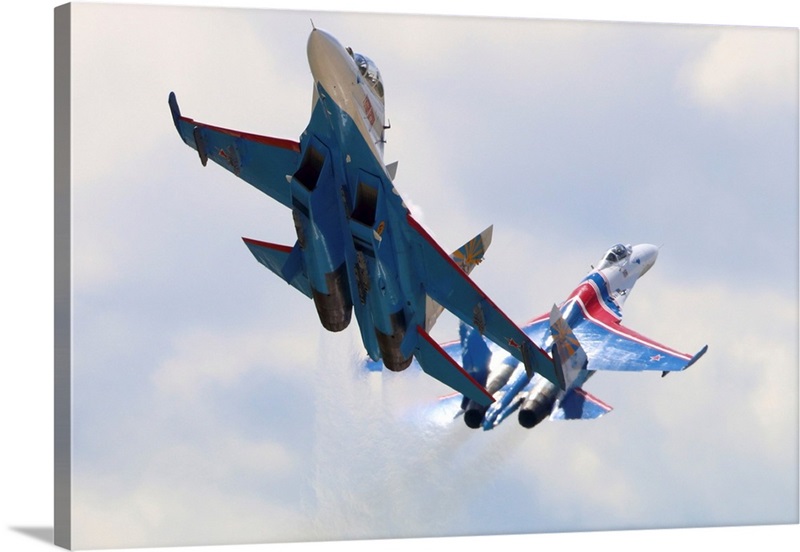 A Sukhoi Su-27 Flanker of the Russian Knights aerobatic team Solid-Faced  Canvas Print