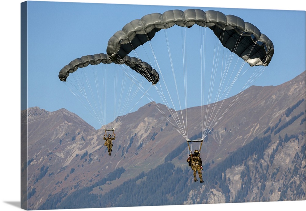 Swiss Army Paratroopers Descending Through The Sky, Meiringen, Switzerland