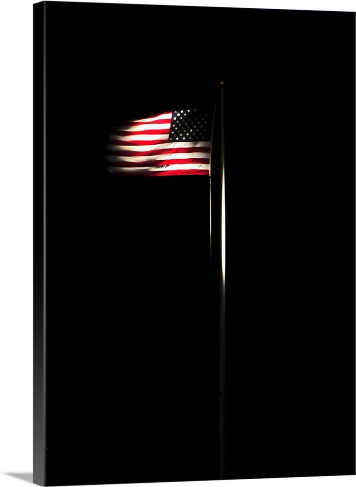 The American flag flies over Naval Station Guantanamo Bay, Cuba.