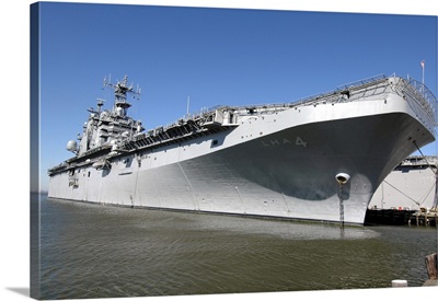 The Amphibious Assault Ship USS Nassau Sits Moored In Port