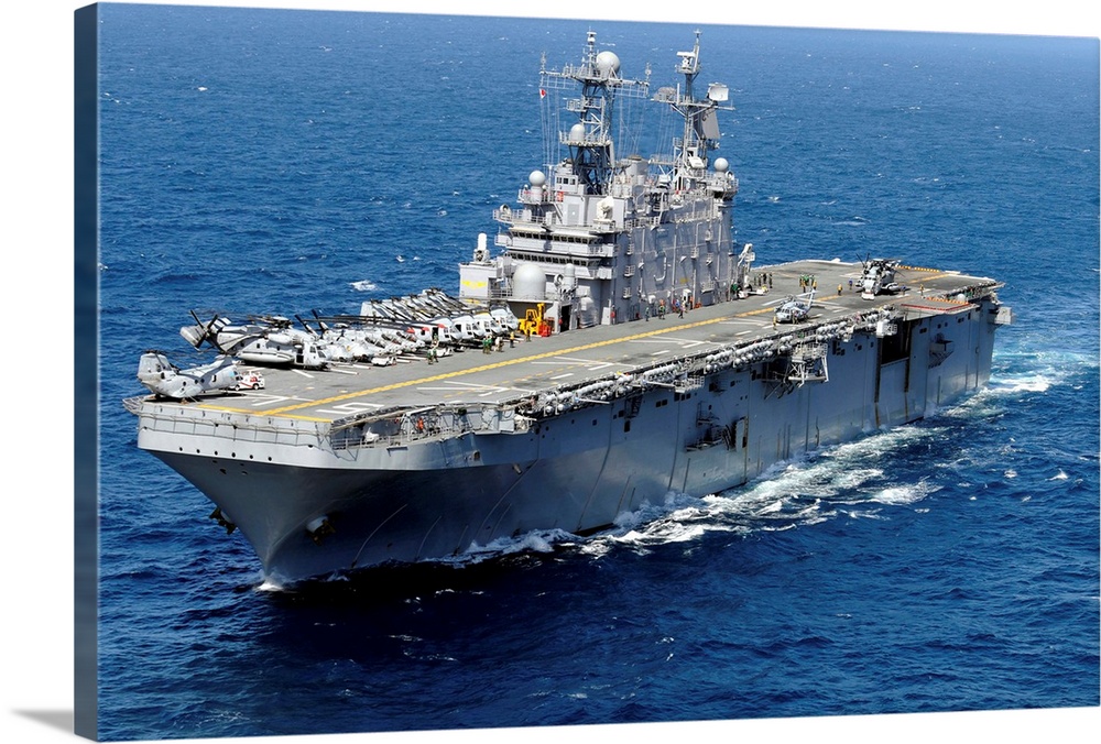 The amphibious assault ship USS Peleliu in transit in the Pacific Ocean.