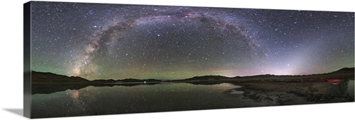 The arc of the Milky Way and zodiacal light appear over Yamdrok Lake ...