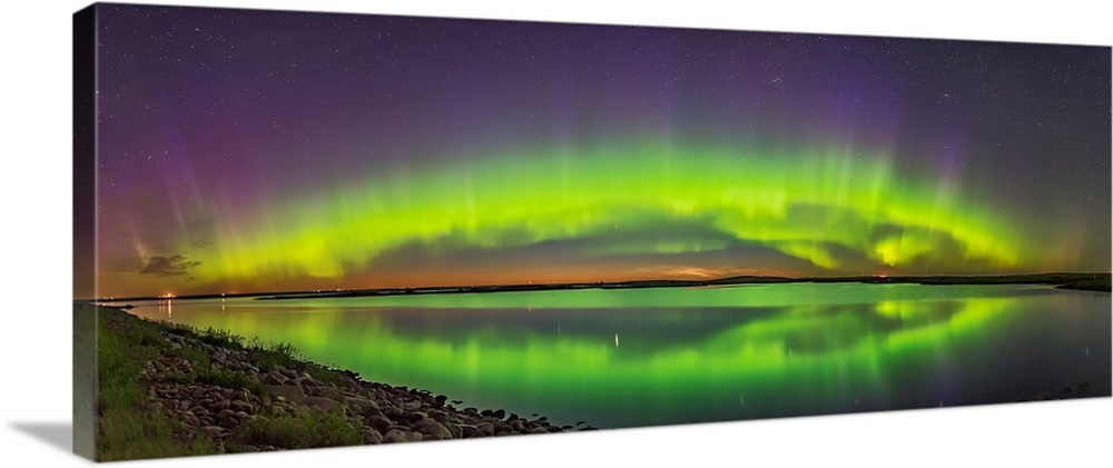 The arch of the auroral oval over Crawling Lake in southern Alberta, Canada.