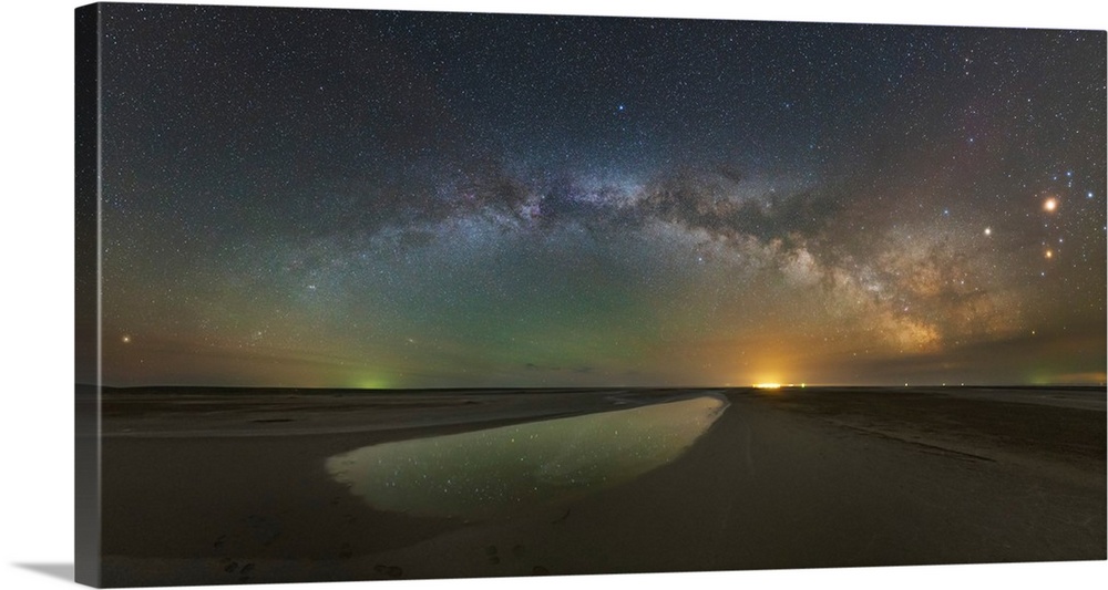 The arch of the Milky Way above Lake Elton salt lake in Russia.