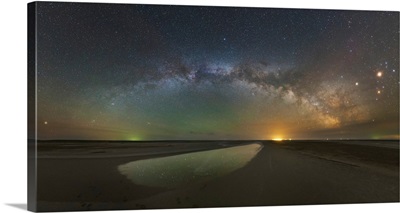 The arch of the Milky Way above Lake Elton salt lake in Russia