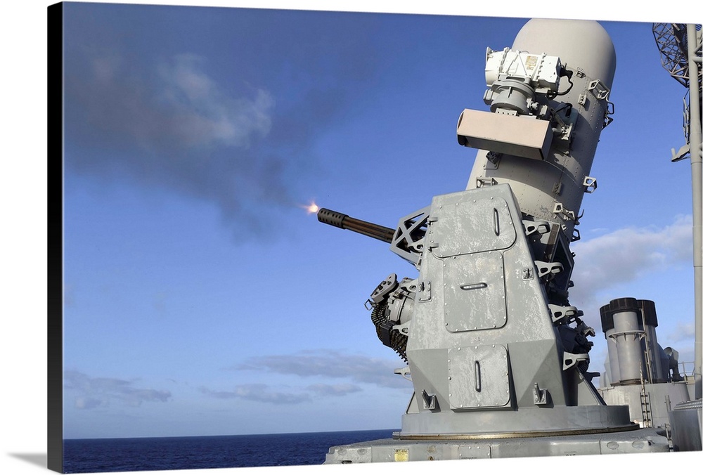 The close-in seapon system fires 20mm rounds aboard USS Vicksburg.