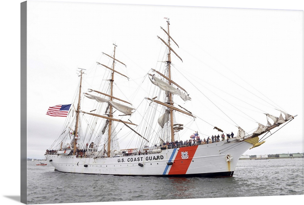 The Coast Guard Cutter Eagle is preparing to moor in Portland Harbor, Maine.