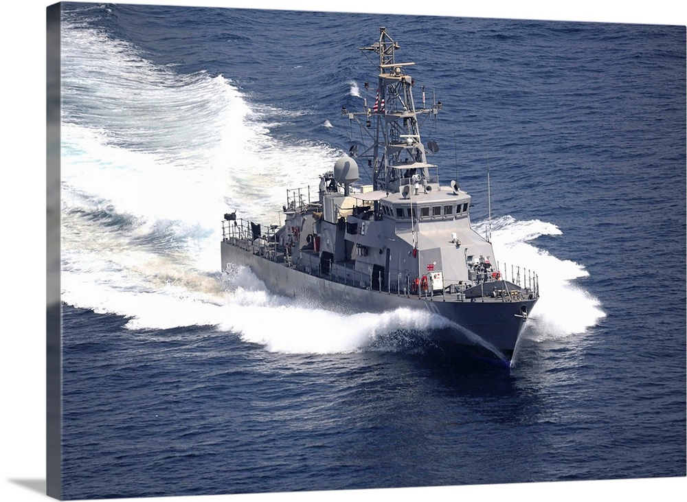 The cyclone-class coastal patrol ship USS Firebolt transits the Arabian Gulf.