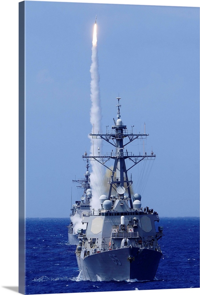 The guided-missile destroyer USS Benfold fires a surface-to-air missile off the coast of Hawaii.