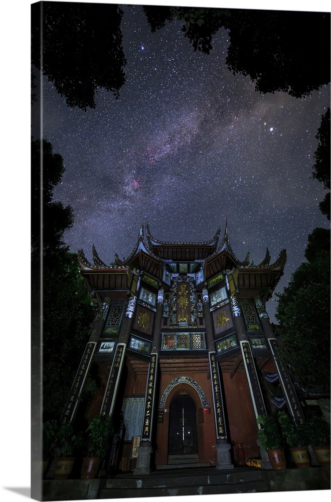 The Milky Way appears above an ancient temple in Sichuan province of China.