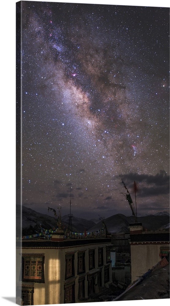 A spectacular view of the Milky Way photographed over a small village in Tibet, China