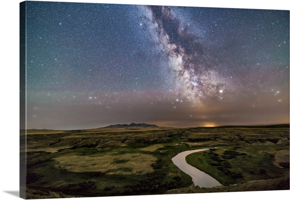 The Milky Way over the Milk River, Alberta, Canada.