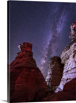 The Milky Way rises above the Wedding Party rock formation in Oklahoma