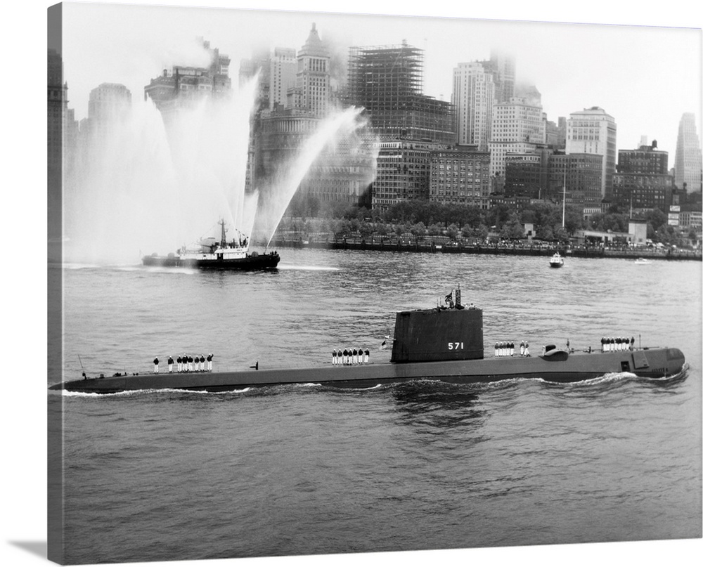 The nuclear submarine USS Nautilus anchored in New York Harbor in 1958, with the skyline of downtown Manhattan in the back...