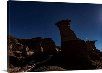 The Pleiades Appearing From Behind The Hoodoos In Silhouette