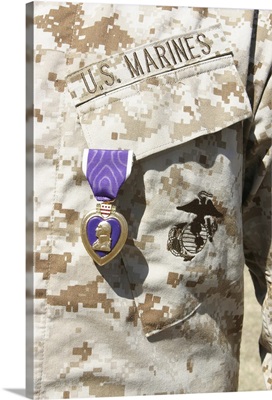 The Purple Heart award hangs over the heart of a U.S. Marine