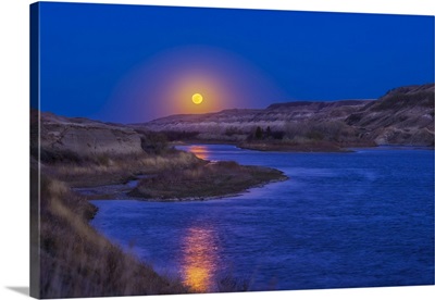 The Rising Full Moon Coming Up Over The Red Deer River Near East Coulee, Alberta