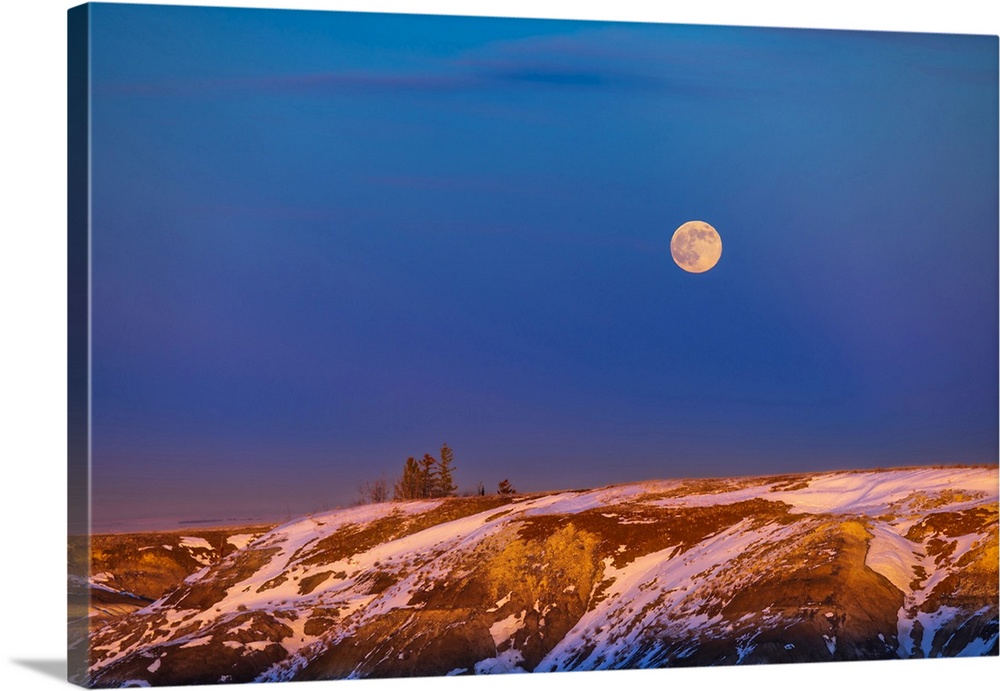 The Rising Full Moon Over The Badlands Of Horseshoe Canyon, Alberta, Canada