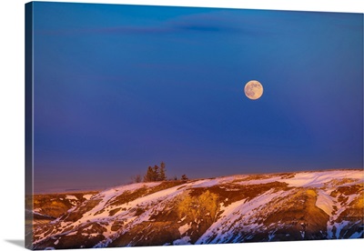 The Rising Full Moon Over The Badlands Of Horseshoe Canyon, Alberta, Canada