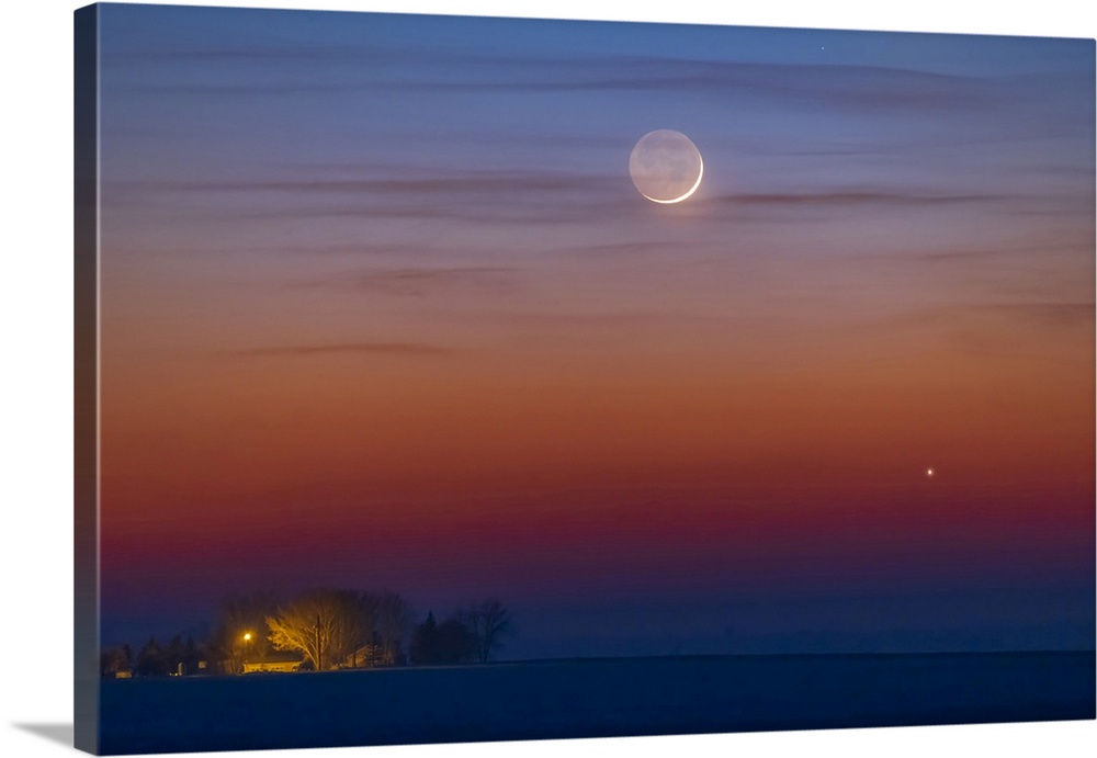 The Thin One-Day-Old Crescent Moon Just Above Jupiter, Alberta, Canada