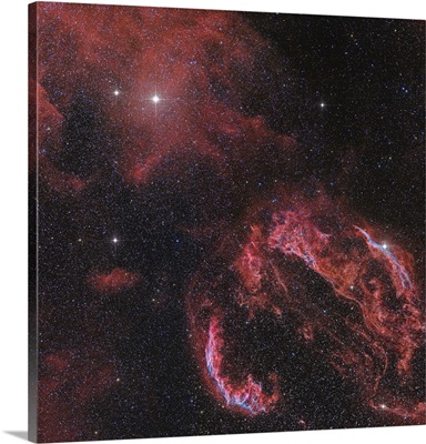 The Veil Nebula in the constellation Cygnus glows red
