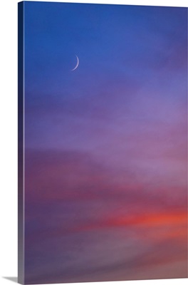 The Waxing 3-Day-Old Crescent Moon Above Venus Amidst A Summer Sunset