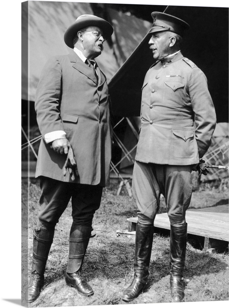 Former U.S. President Theodore Roosevelt engaged in deep conversation with General Leonard Wood during the First World War.