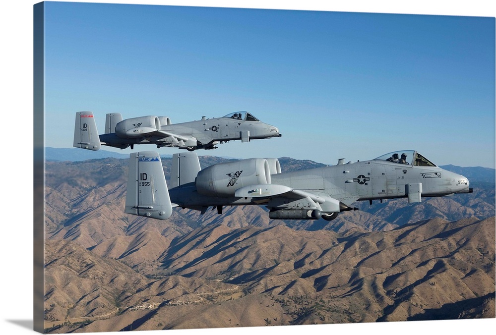 Two A-10 Thunderbolt's from the 124th Fighter Wing's 190th Fighter Squadron fly over Central Idaho.