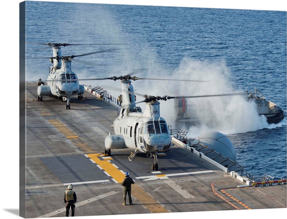 Two CH-46E Sea Knight helicopters on the flight deck of USS Bonhomme  Richard Solid-Faced Canvas Print