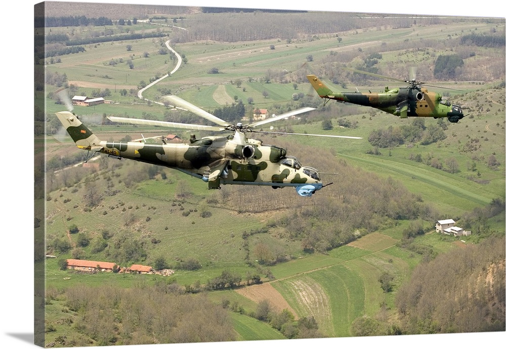 Two Mi-24V Hinds of the Combat Helicopter Squadron of the Macedonian Air Force.