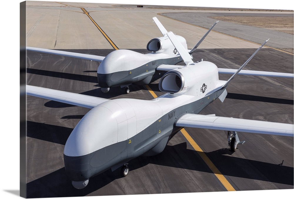 May 21, 2013 - Two Northrop Grumman MQ-4C Triton unmanned aerial vehicles on the tarmac at a Northrop Grumman test facilit...