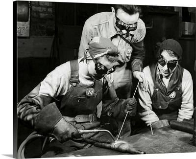 Two Women Learning To Weld With Their Instructor, 1943
