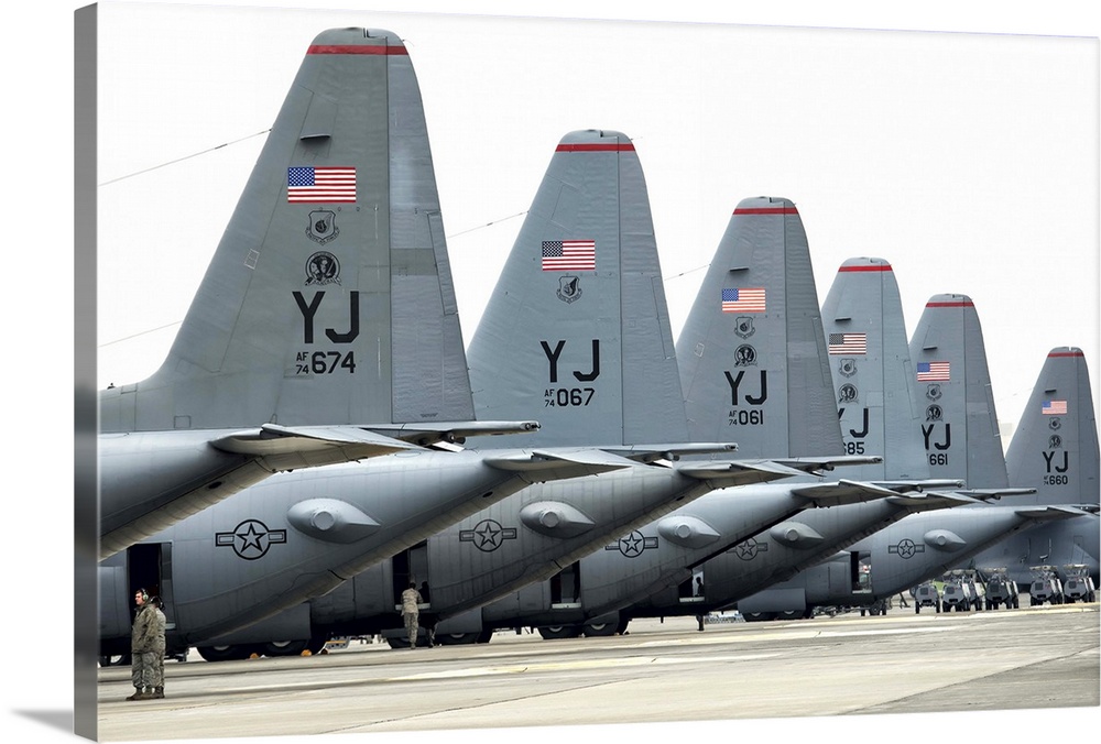 October 22, 2013 - U.S. Air Force C-130 Hercules aircraft sit on the flight line at Yokota Air Base, Japan, before a large...