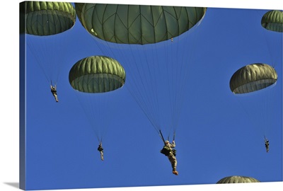 U.S. Army paratroopers participate in a personnel drop