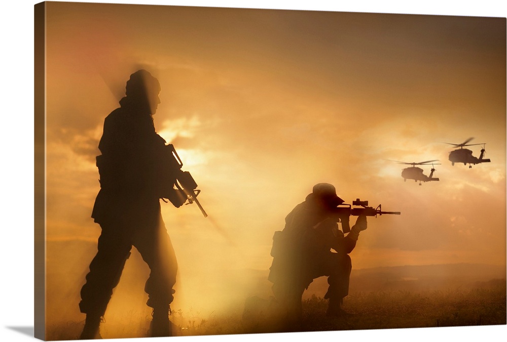 Large photograph depicts the silhouette of two United States military individuals securing a landing area for a couple cho...