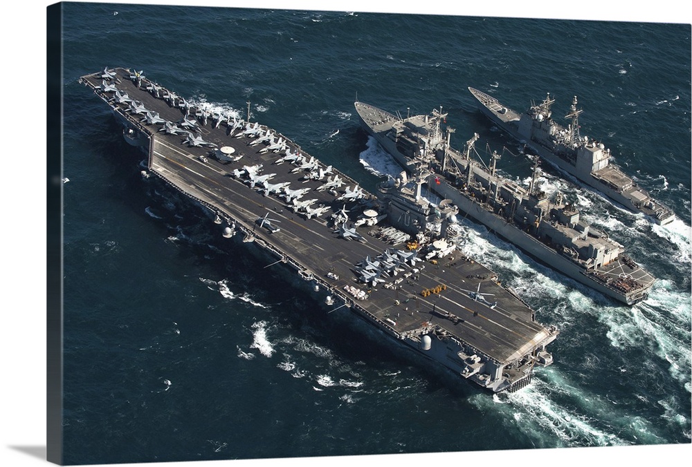 Underway replenishment at sea with U.S. Navy ships in the Arabian Gulf.